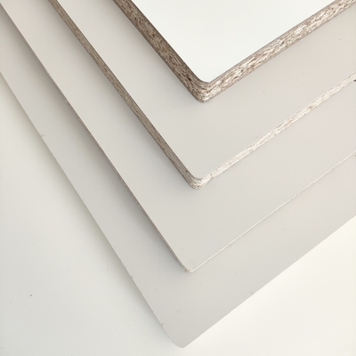 Wholesale Cheap 18mm OSB Flakeboard Melamine Faced Chipboard Wood Door Panel Sheet Finished Surface for Kitchen Cabinets Bedroom