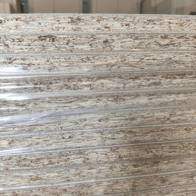 Best Selling 18mm Eco-friendly PET OSB Laminated Flake Board Plywood Chip Sheets for Kitchen Bedroom Bathroom Indoor